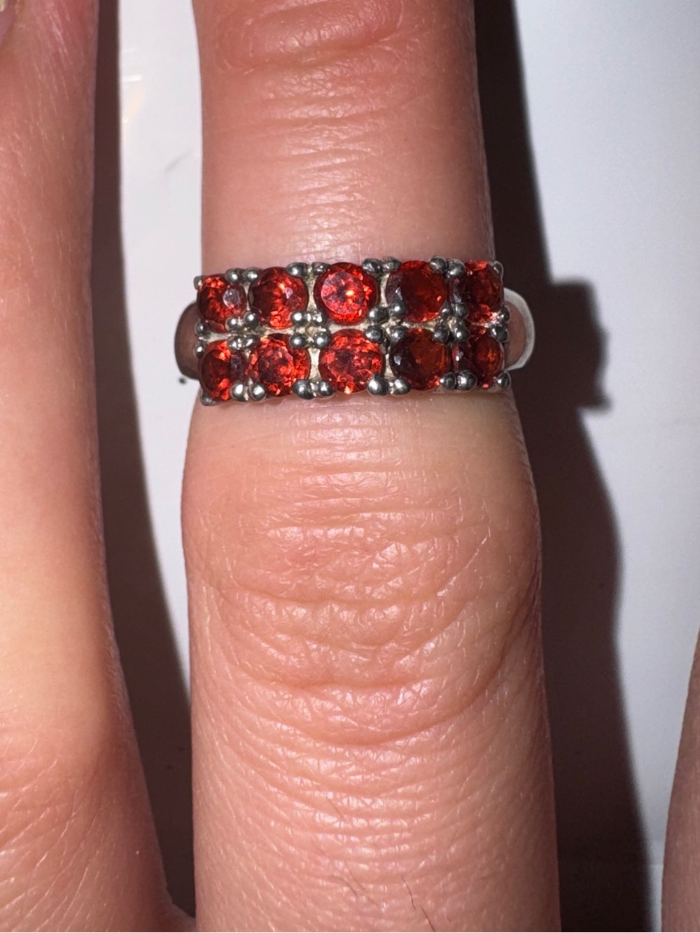 Silver ring with red stones